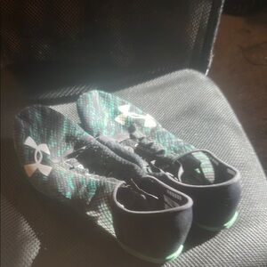 Under armor, miller pro, track shoes
With spikes